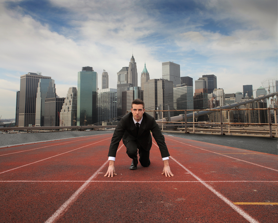 Businessman starting new venture, on a race track toward his new path (the photo is analogy)